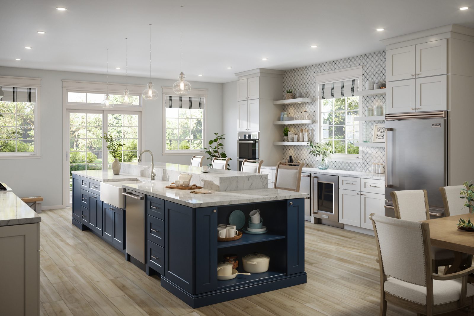 Coastal kitchen with navy island and marble waterfall countertop